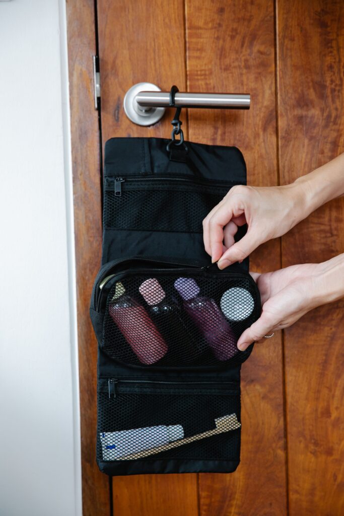 college skincare essentials - travel-size skincare products packed for a dorm room